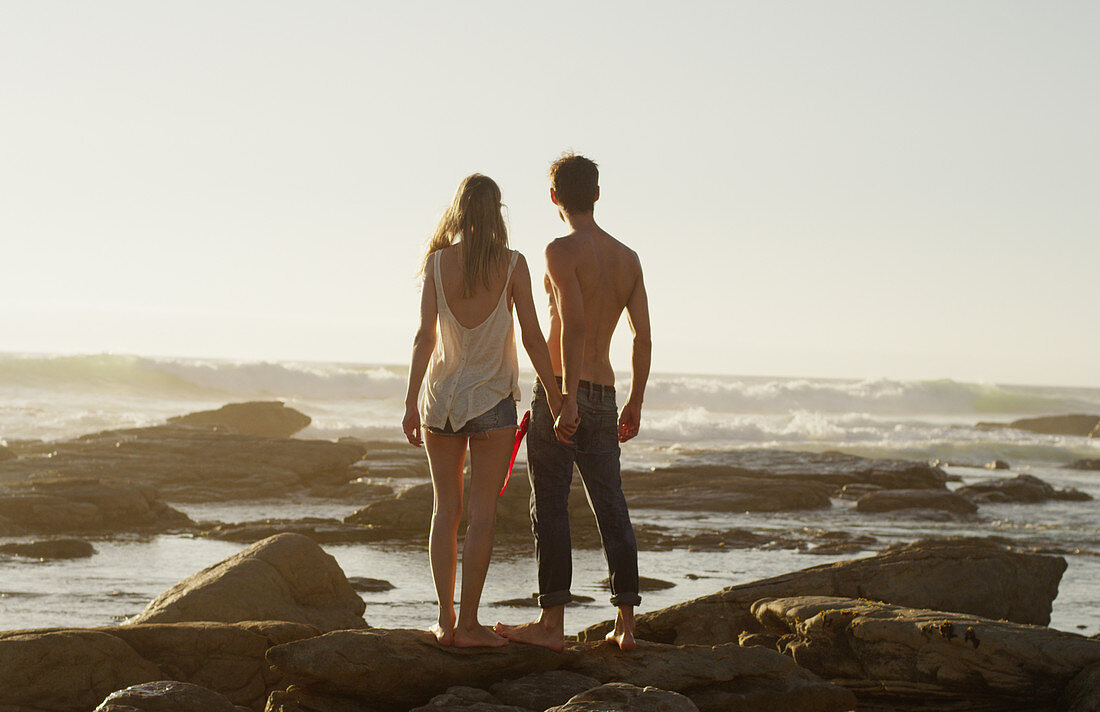 Young couple holding hands