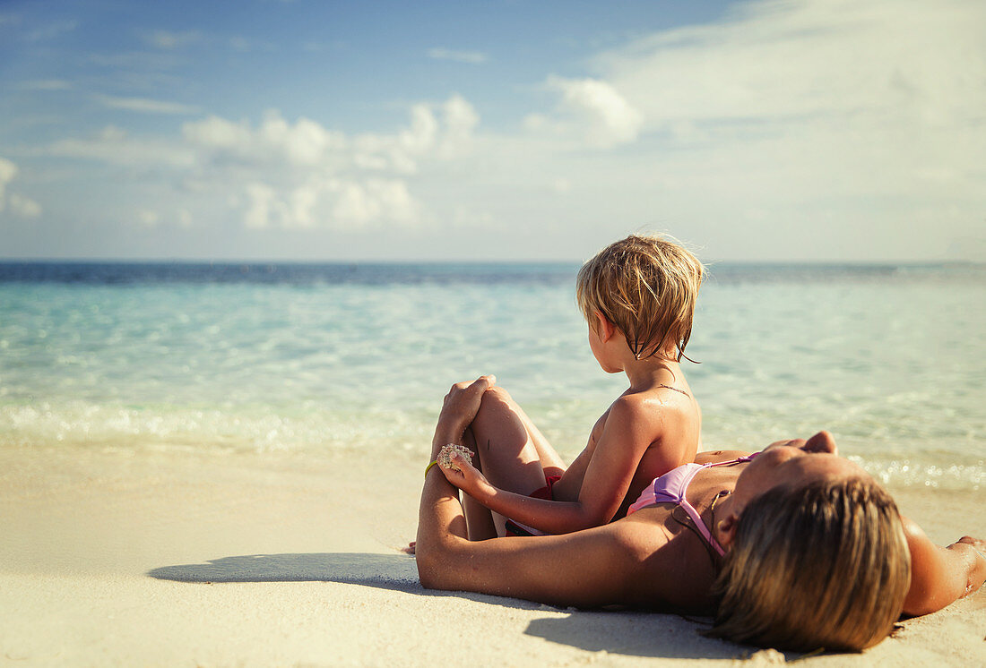 Mother and son on tropical beach