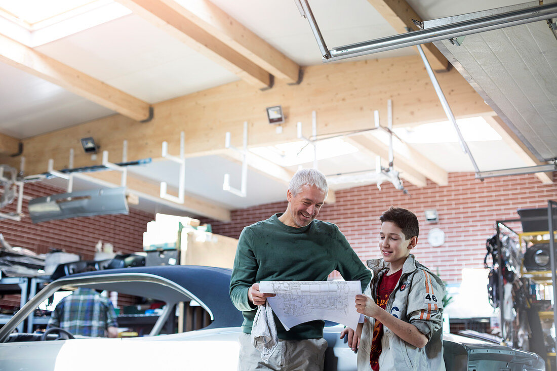 Father and son in auto repair shop