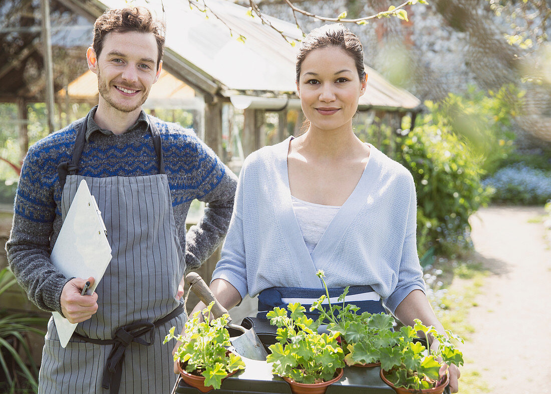 Plant nursery workers with clipboard