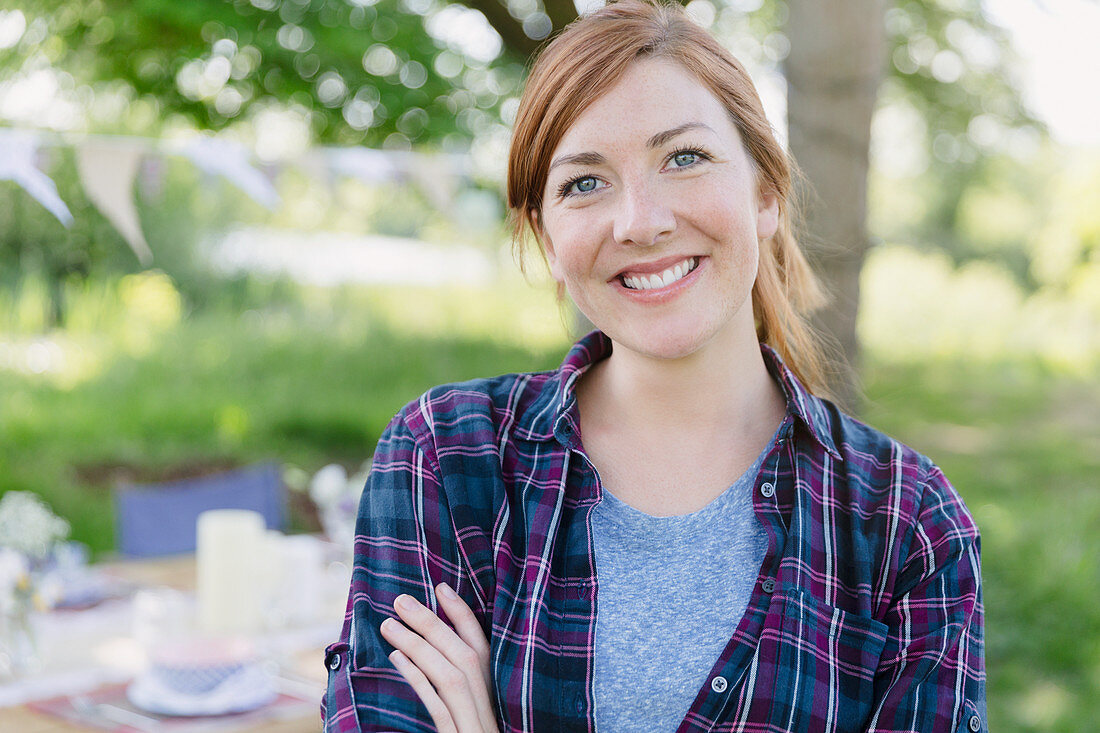 Portrait smiling woman in backyard