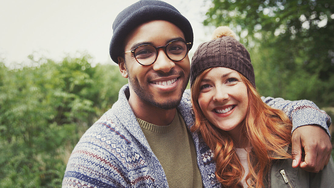 Portrait smiling couple hugging