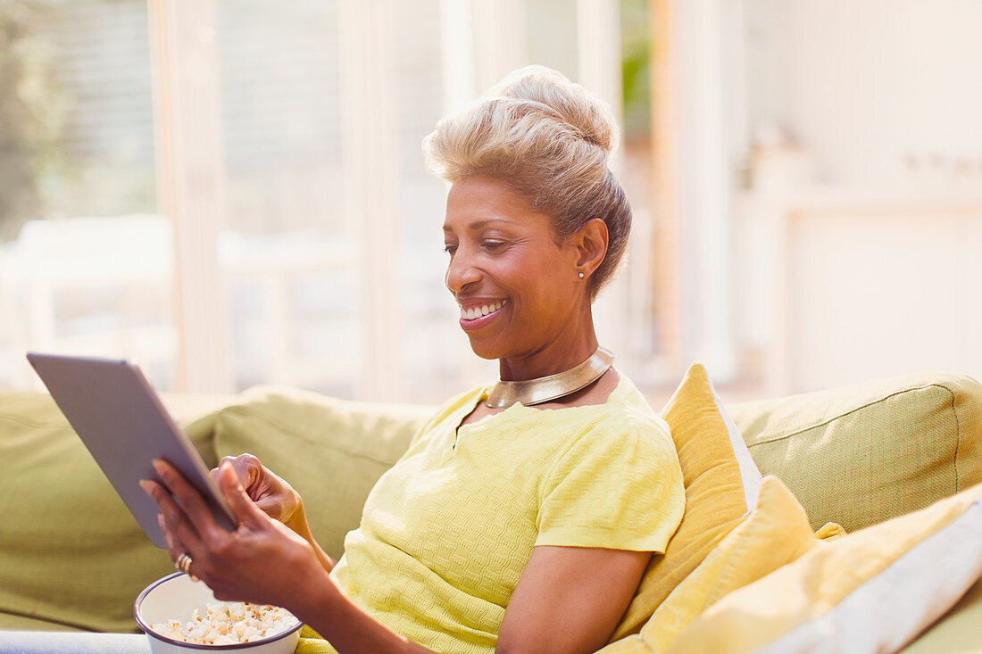 Mature women using digital tablet