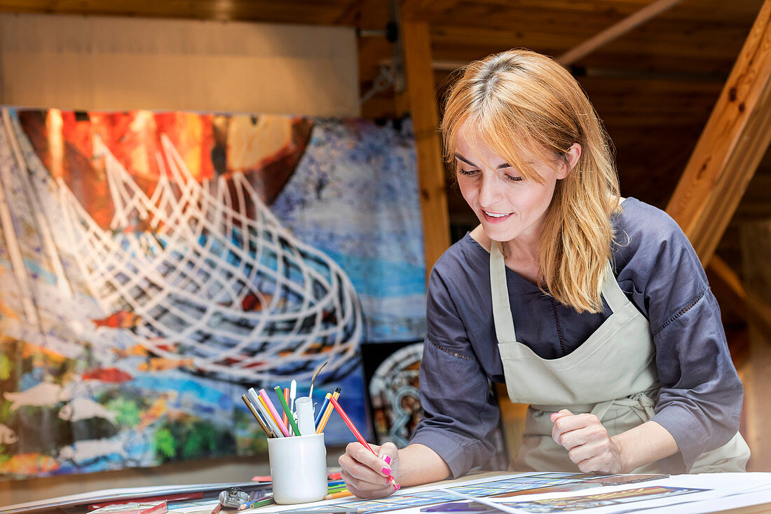 Artist drawing in studio