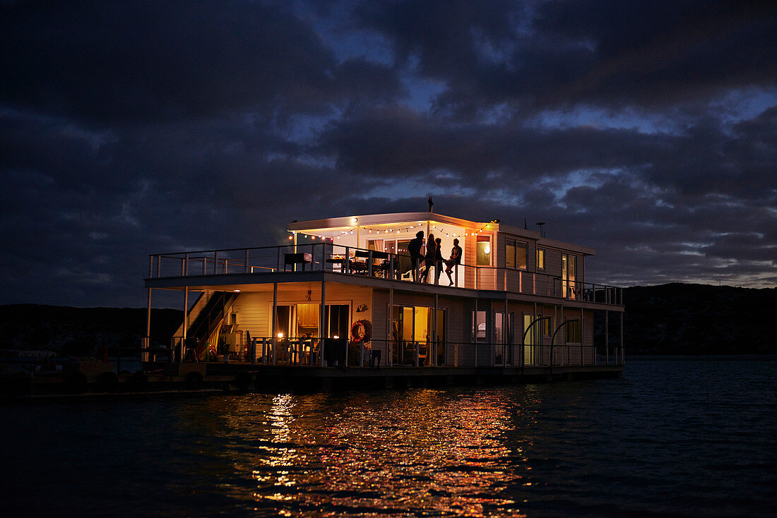 Summer houseboat illuminated