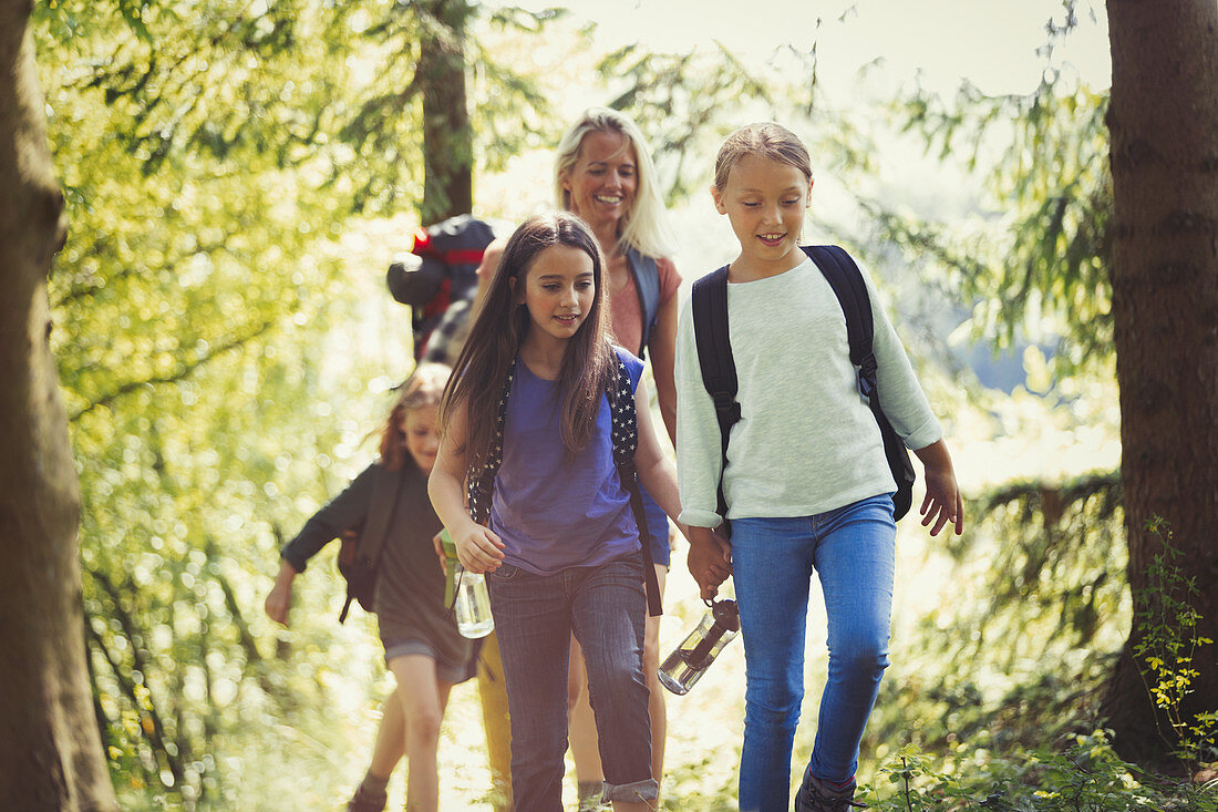 Mother and daughters hiking