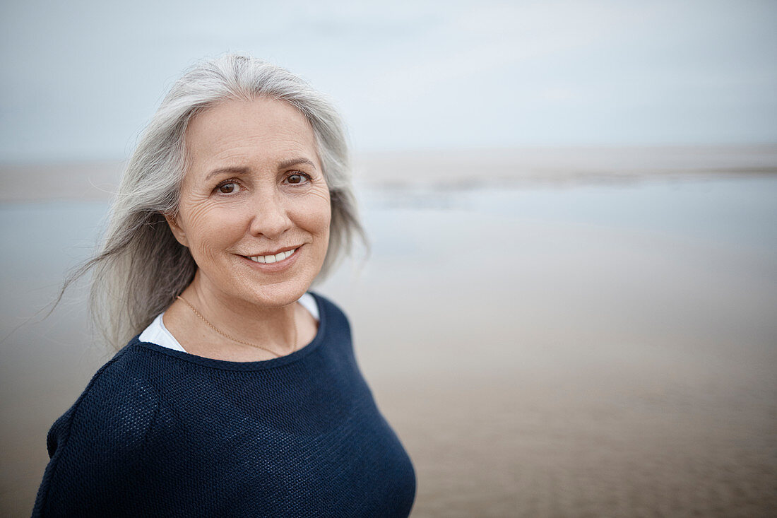 Portrait senior woman on beach