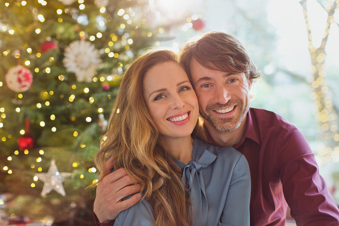 Smiling couple hugging