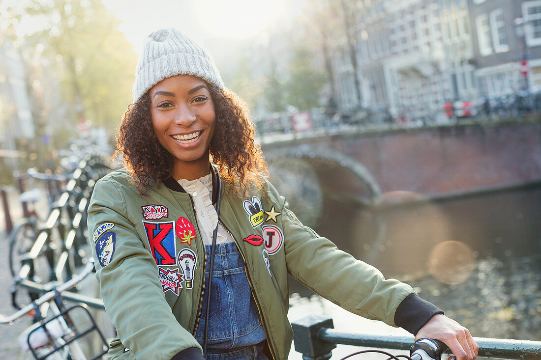 Young woman along canal