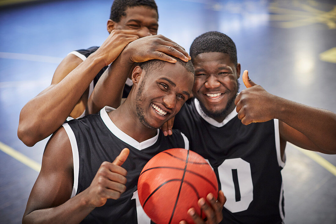 Portrait basketball player team celebrating