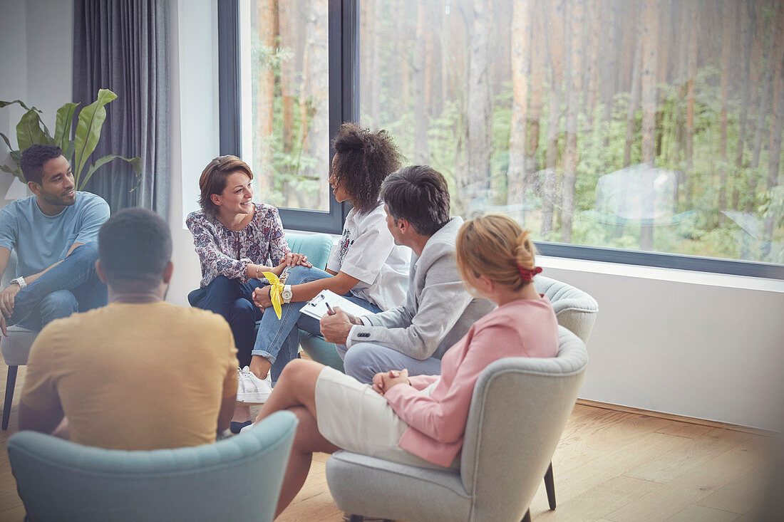 Women talking in group therapy session