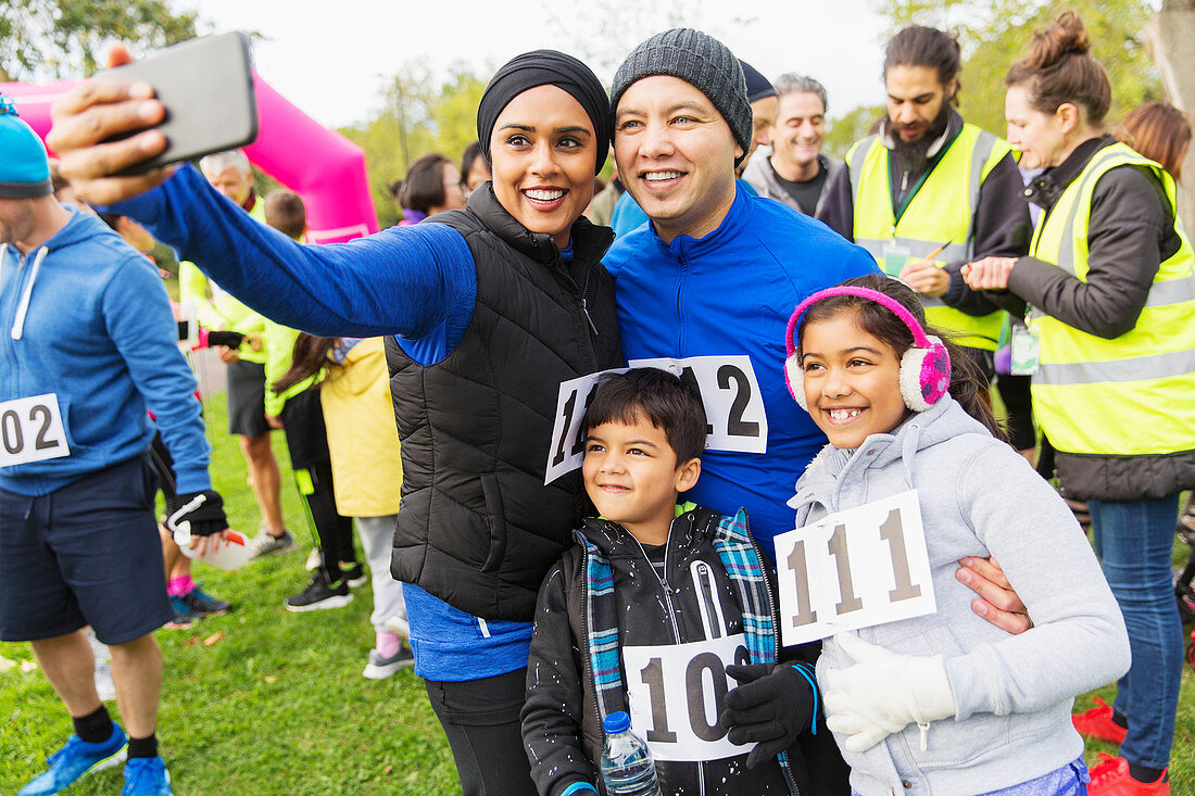 Family charity run runners taking selfie