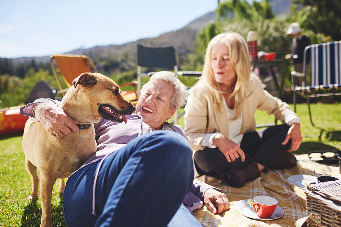 Happy active senior women and dog