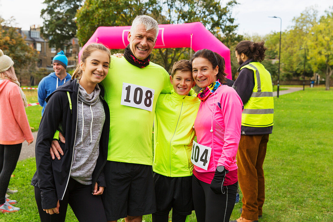 Portrait smiling family runners