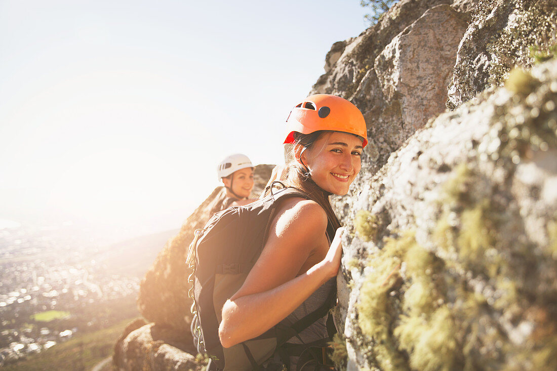 Portrait smiling female rock climber