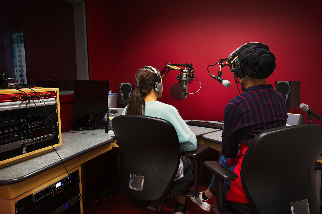 Teenage girl musicians recording music