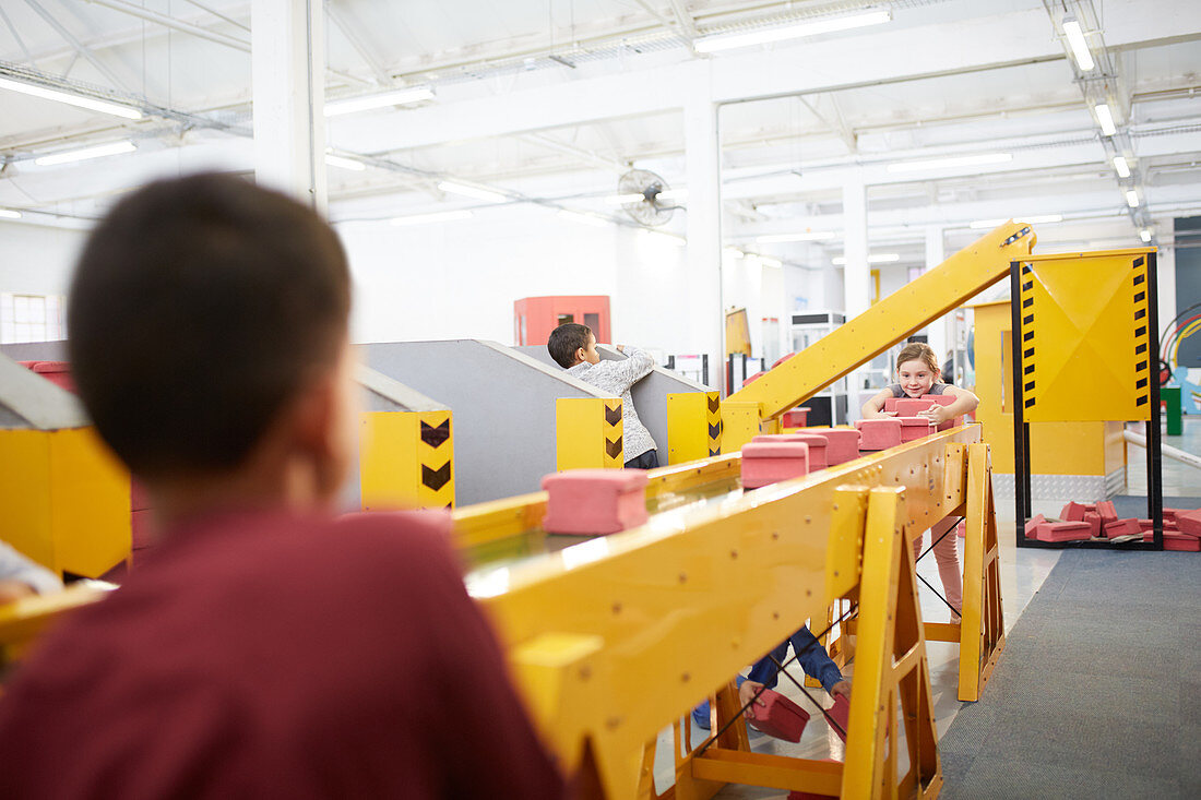 Kids playing at interactive construction exhibit