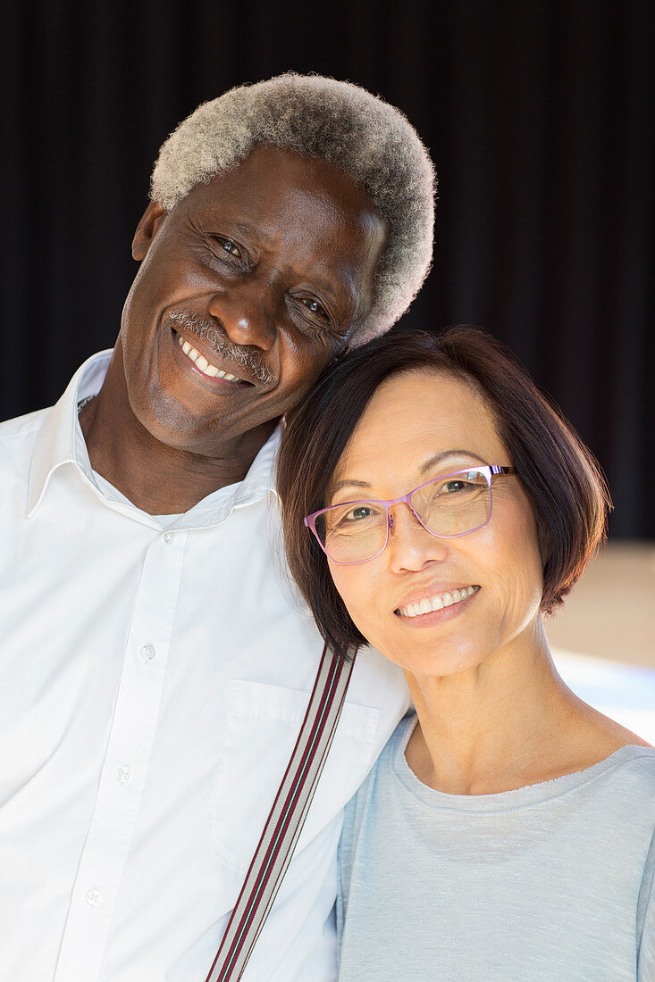 Portrait smiling, affectionate senior couple