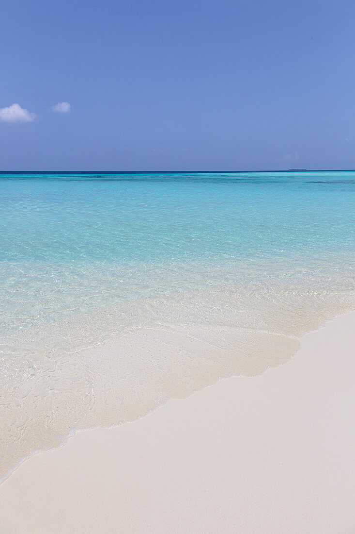 Tranquil, sunny blue ocean beach
