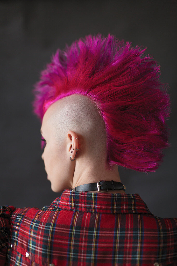 Cool young woman with pink mohawk