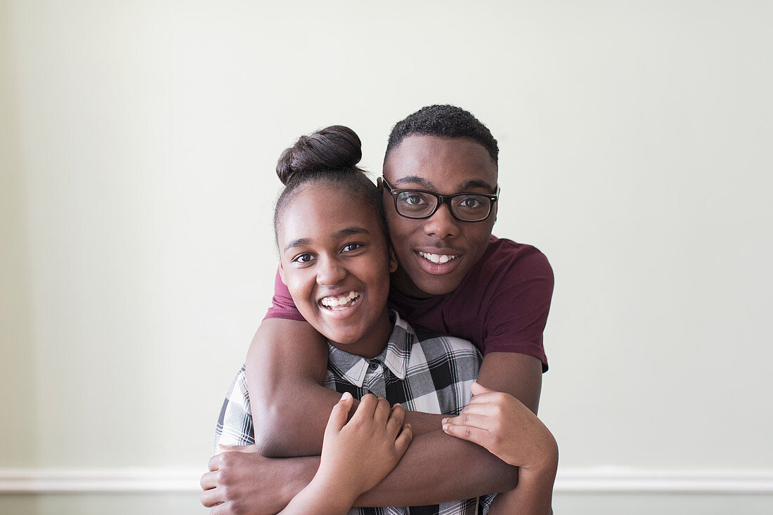 Portrait affectionate teenage brother and sister