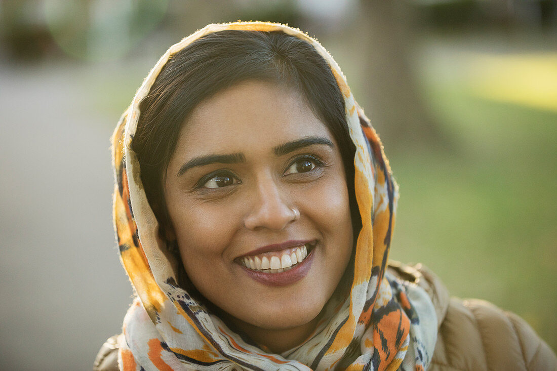 Portrait smiling, happy Muslim woman wearing hijab