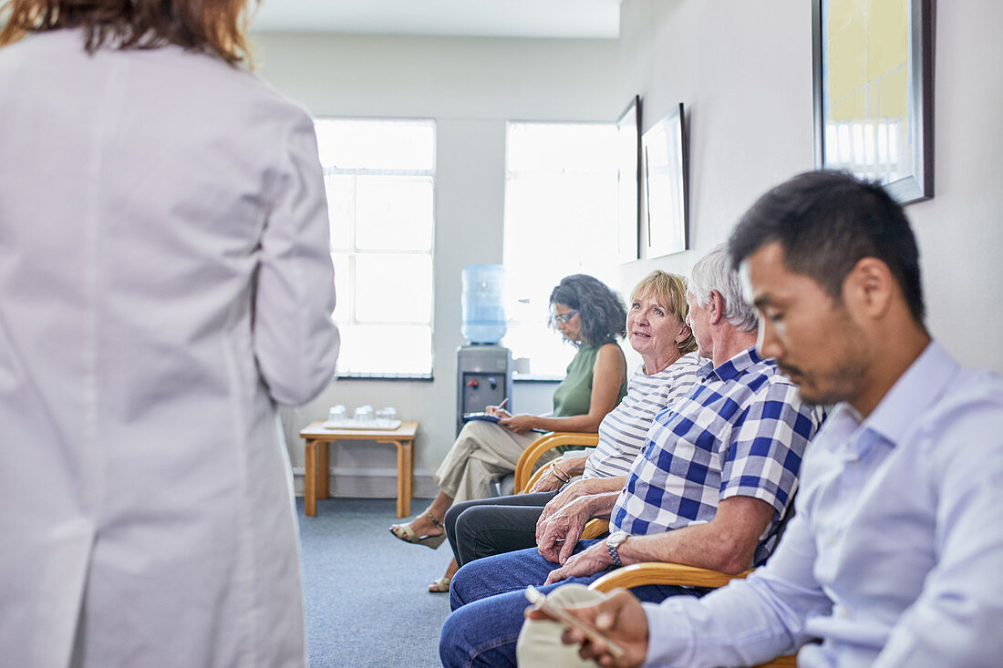 Patients waiting in clinic waiting room