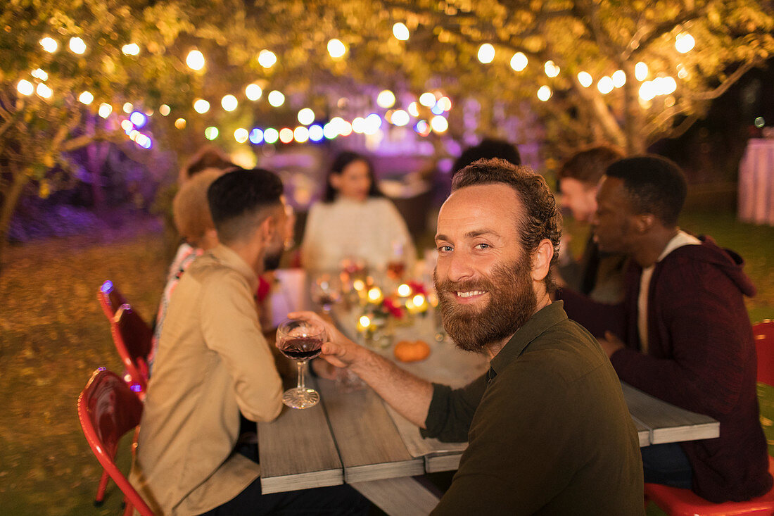 Portrait man drinking wine