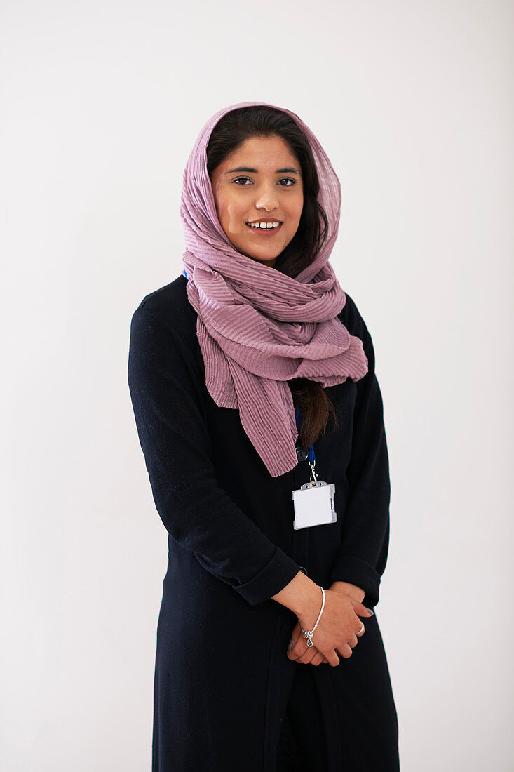Portrait confident young woman wearing hijab