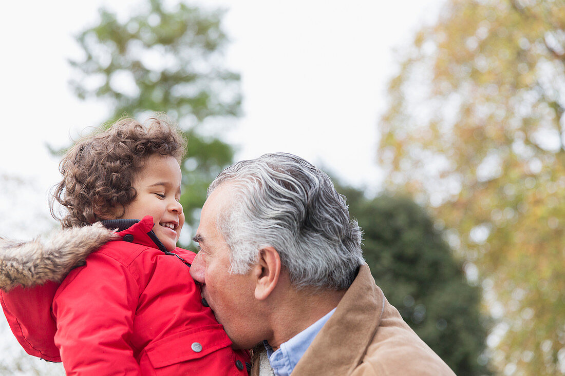 Playful grandfather and grandson