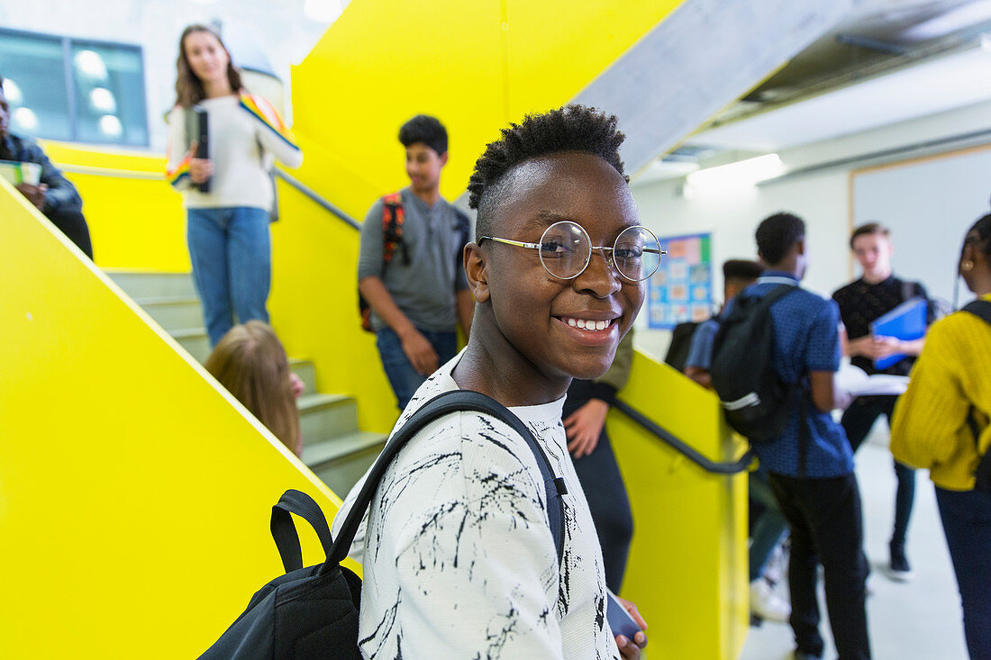 Portrait junior high boy student in corridor