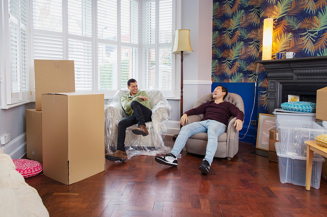 Men taking a break from moving house