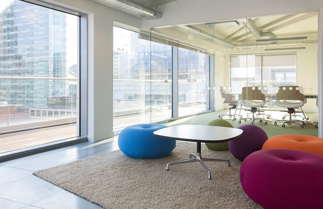 Creative open plan office space with bean bag chairs