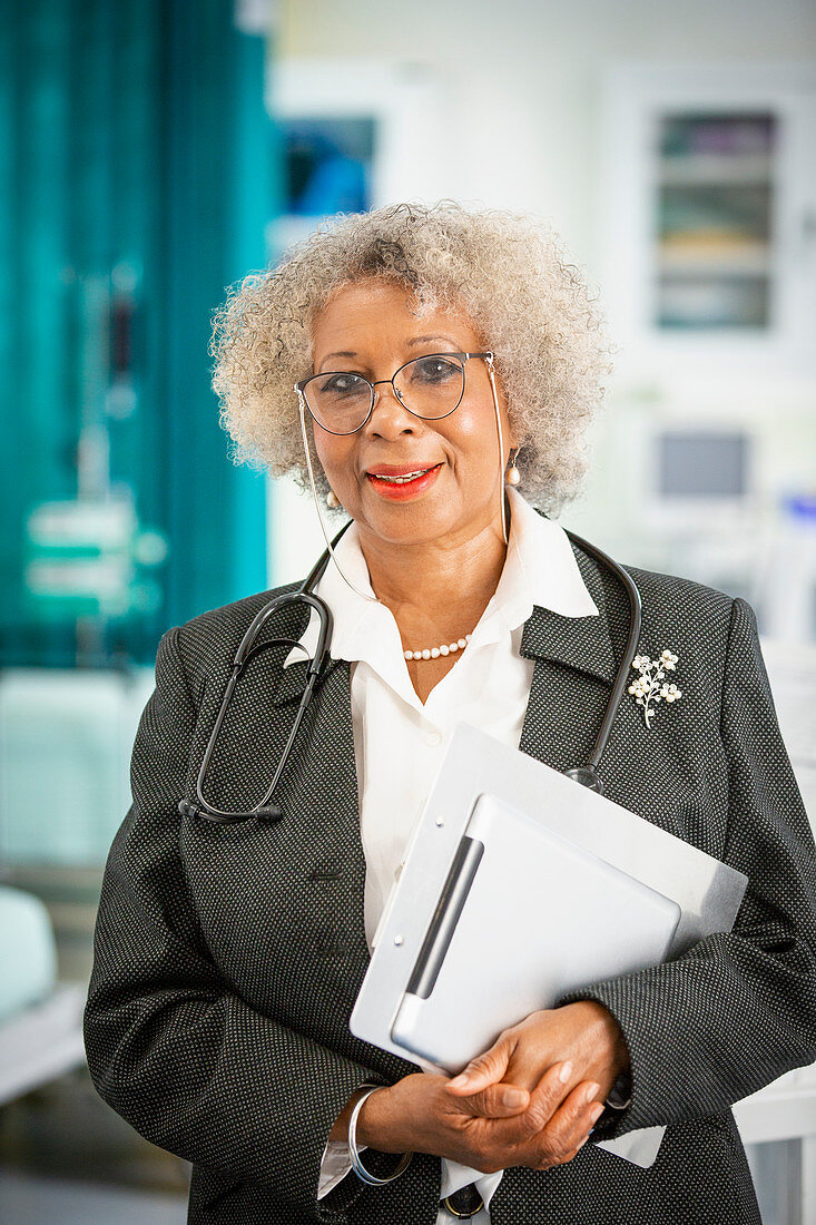 Portrait female doctor making rounds in hospital