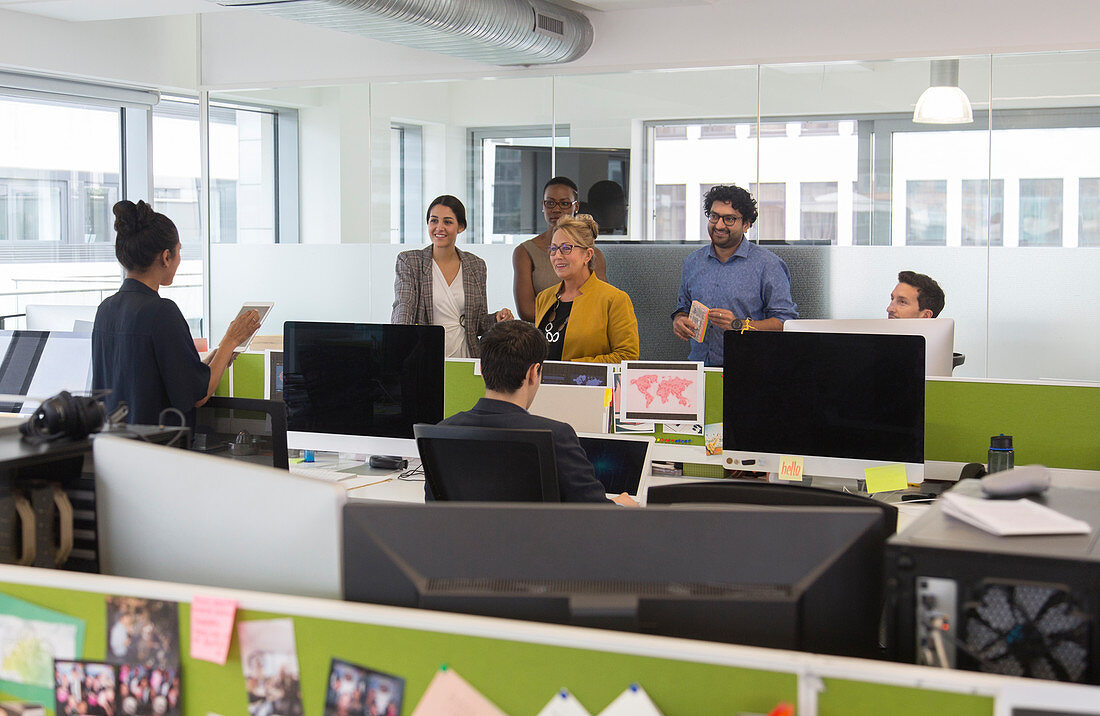 Business people meeting in open plan office