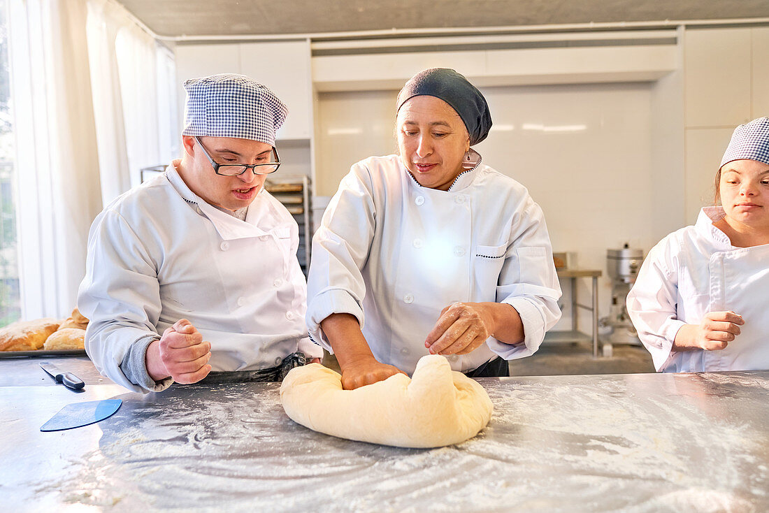 Students with Down Syndrome in baking class