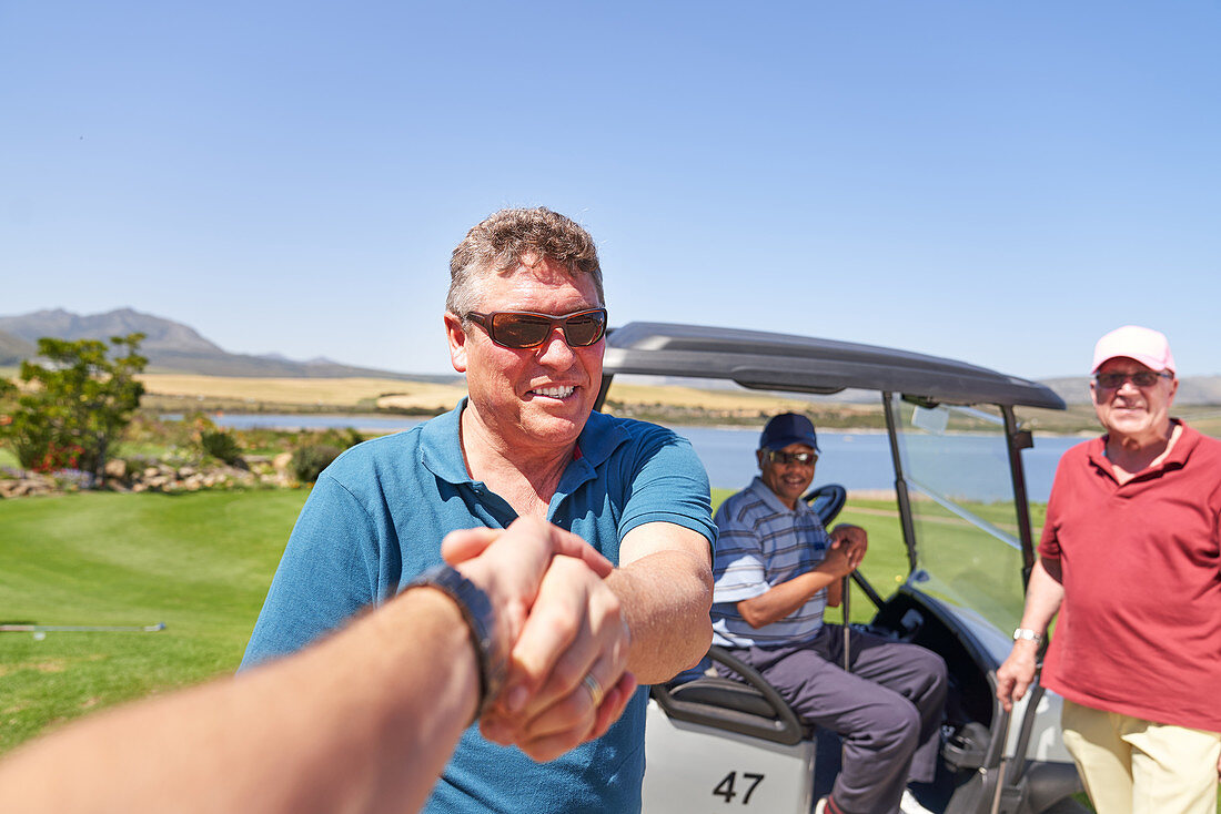 Personal perspective golfers handshaking