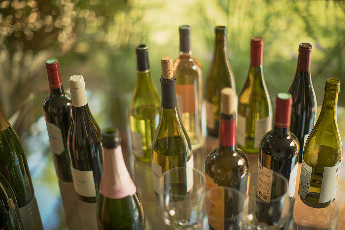 Variety of wine bottles on table