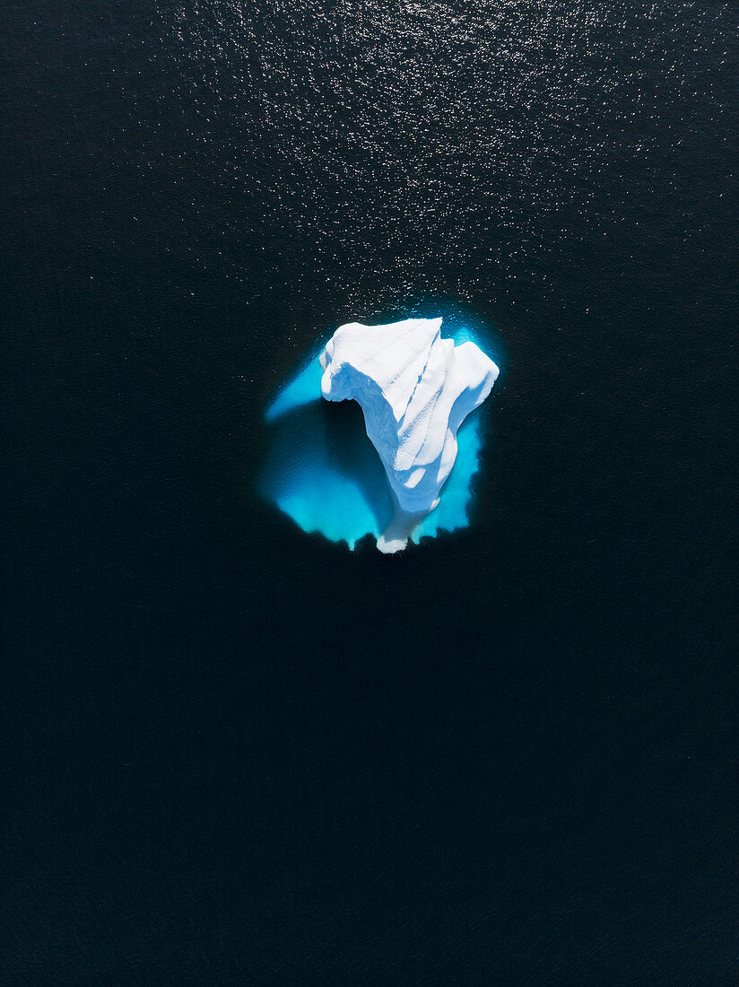 Aerial view melting polar iceberg Greenland