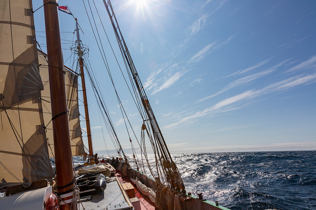 Sailboat on blue Atlantic Ocean Greenland