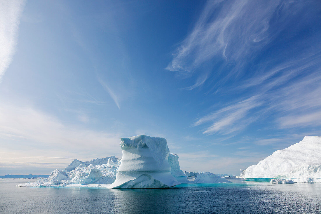 Iceberg formations on blue Atlantic Ocean Greenland
