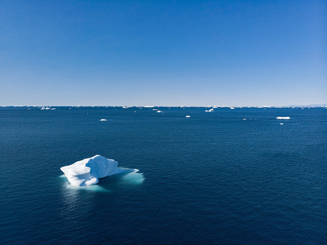 Polar ice melting on vast blue Atlantic Ocean Greenland
