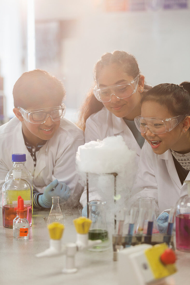 Students conducting scientific experiment in laboratory