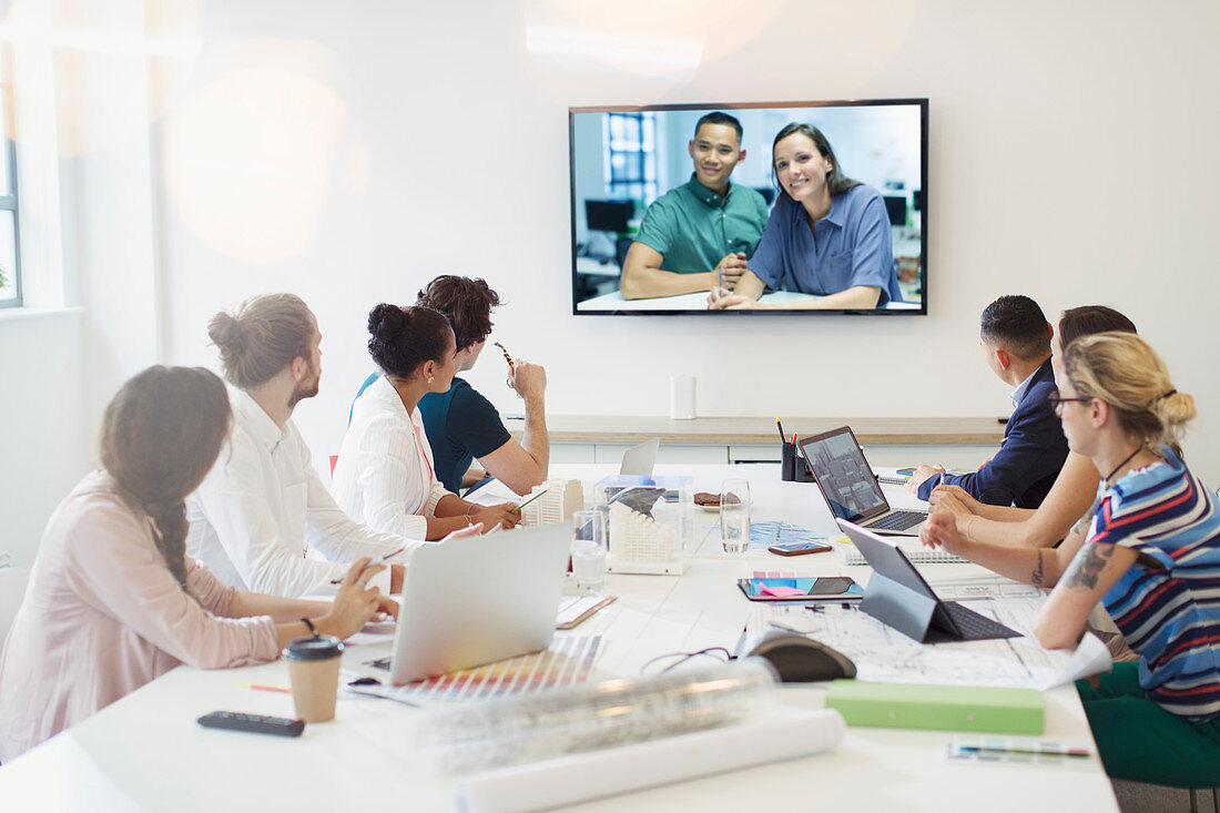 Designers video conferencing with colleagues