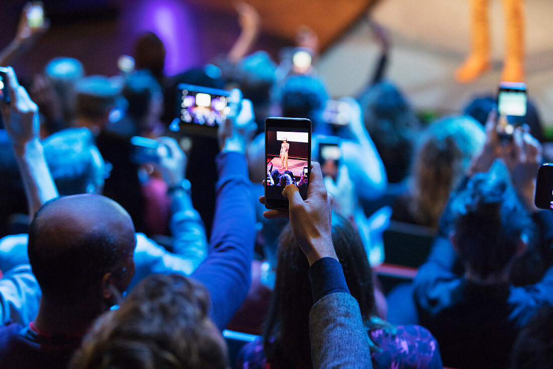 Audience using camera phones