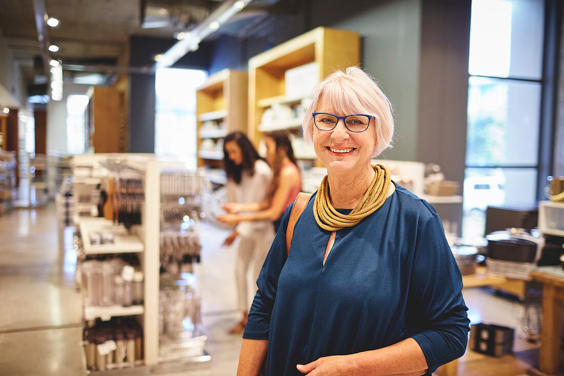 Confident senior woman shopping in home goods store