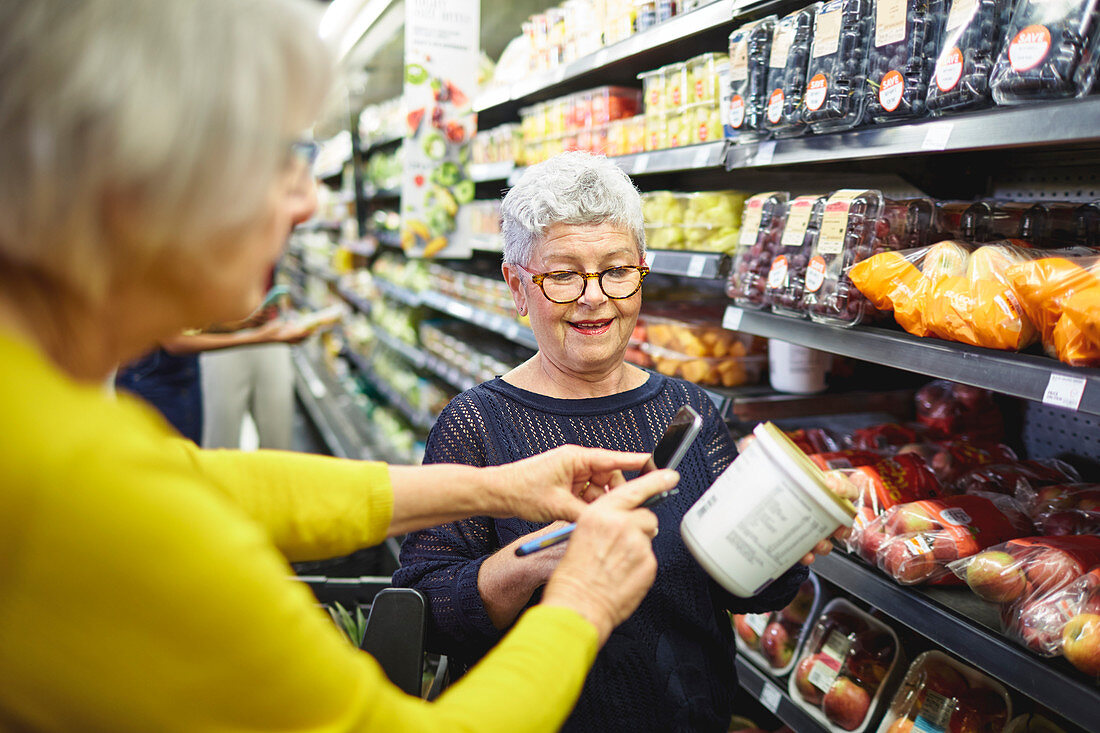 Senior women shopping in supermarket