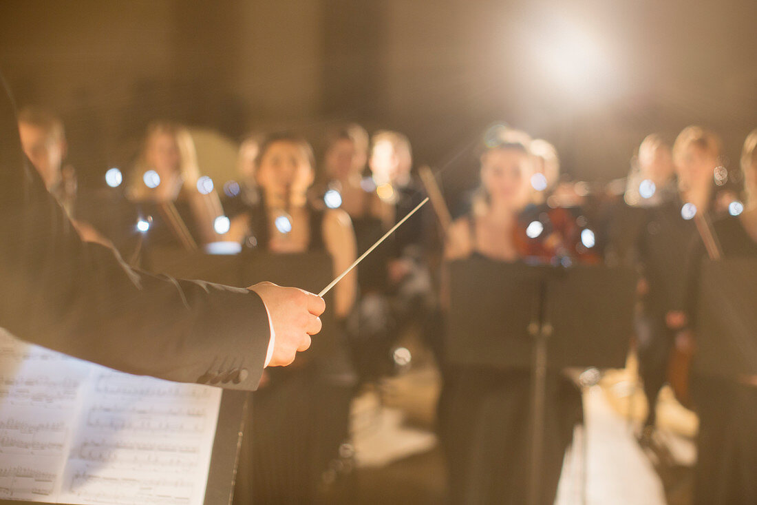 Conductor leading orchestra