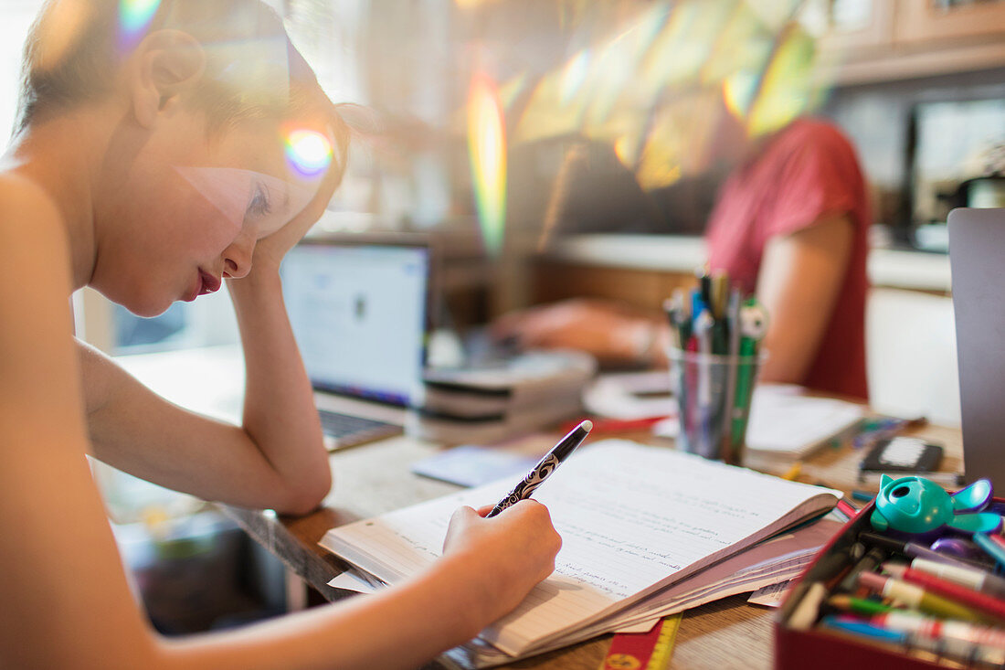 Focused boy homeschooling