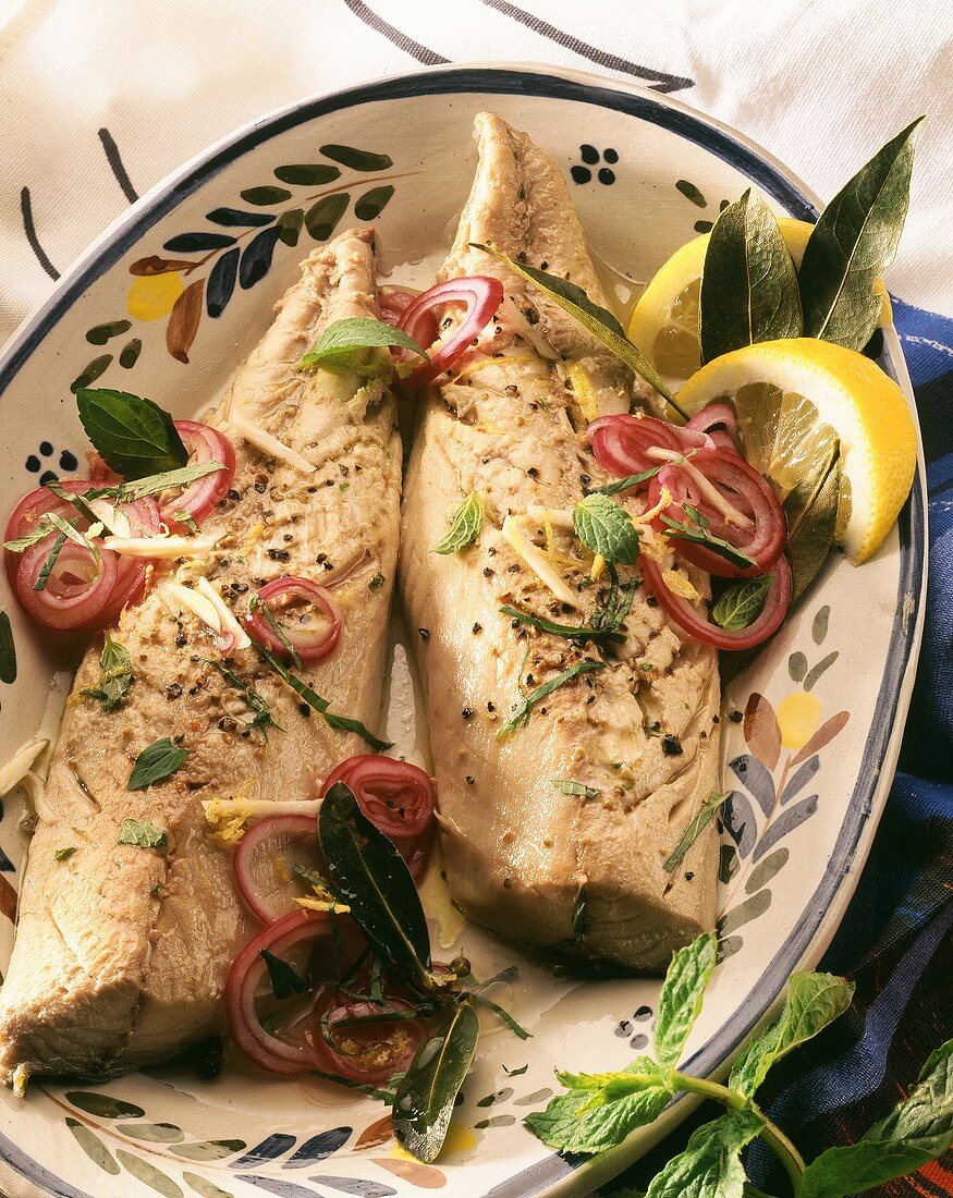 Marinated mackerel fillets with pepper and red onions
